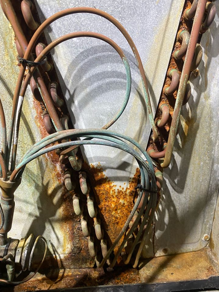 Rheem heat pump rusted out and leaking evaporator coil 