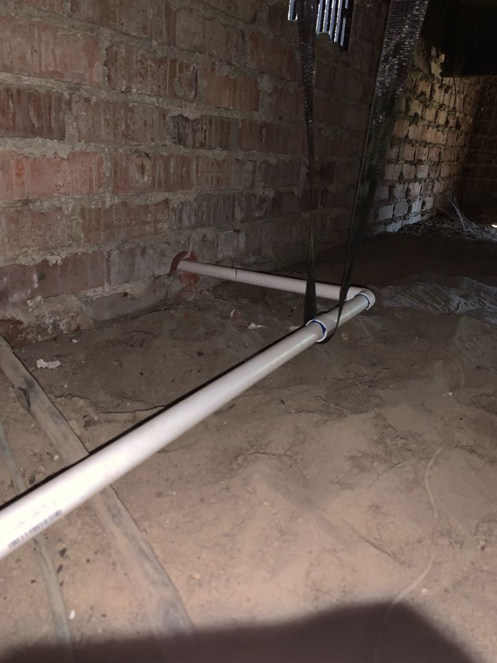 Replacing run of broken duct and running the drain line out from under the home