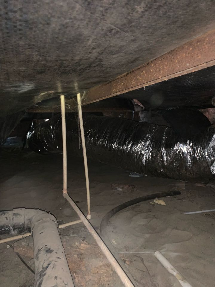 Replacing run of broken duct and running the drain line out from under the home