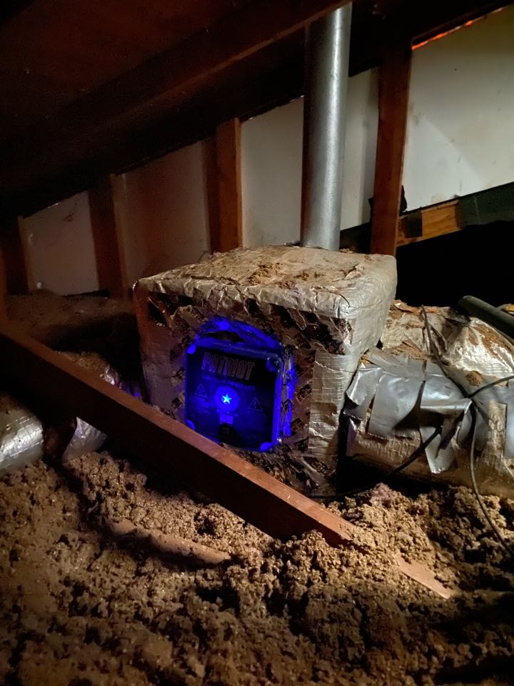 Installation of a Patriot whole home air purifier. 