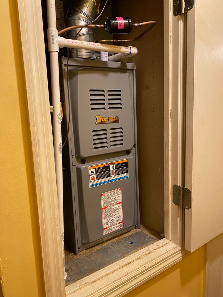 Quality control inspection for the installation of a new Ducane heating and cooling system. 