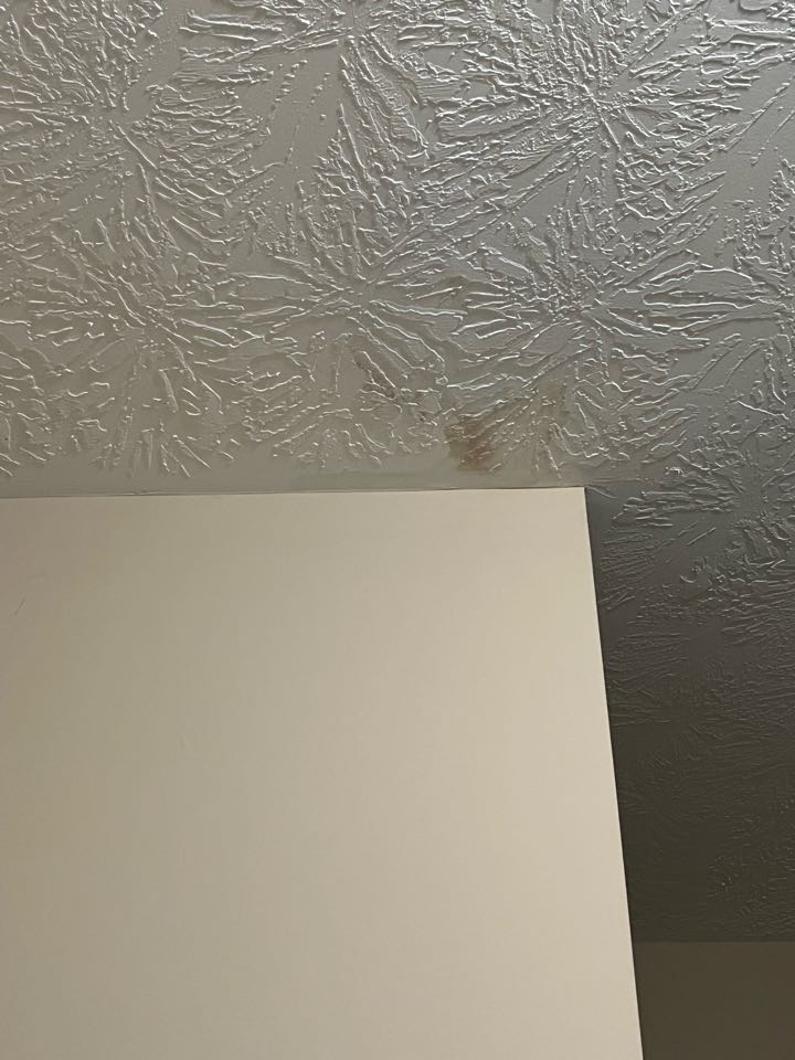 Air conditioning inspection to help determine the source of water damage to ceiling. 