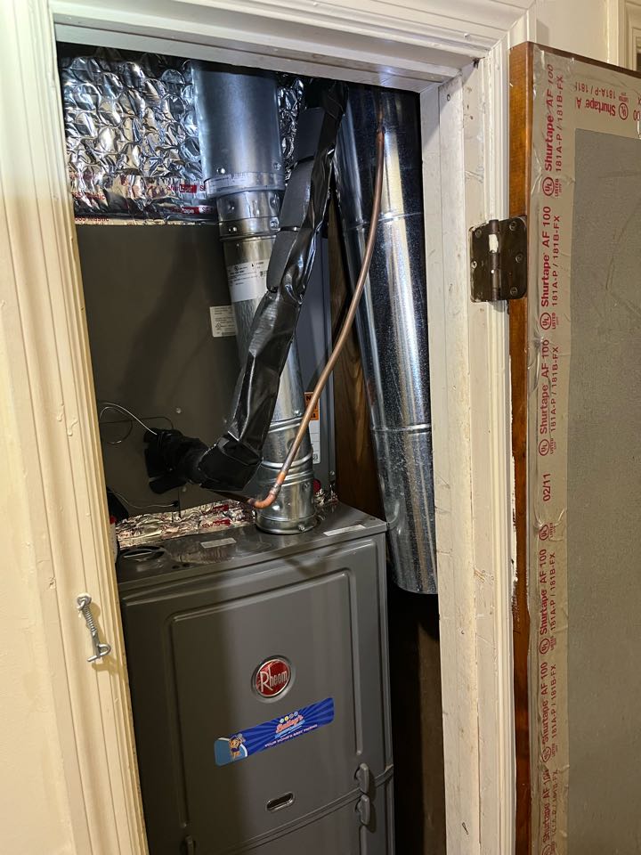 Rheem furnace high and low fresh air intake installation. 