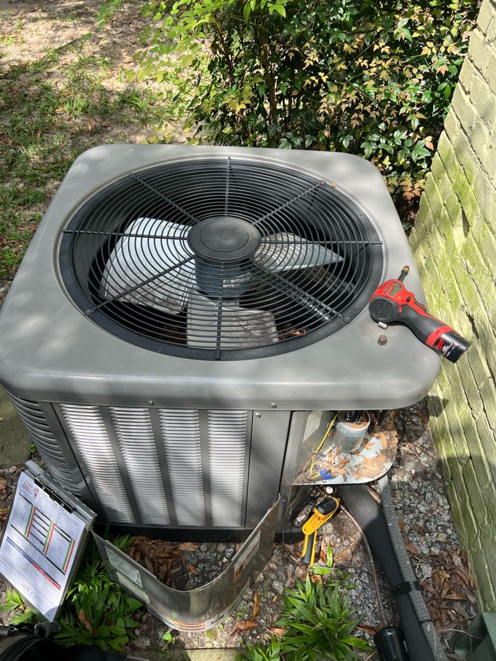 Maintenance on rheem condenser.