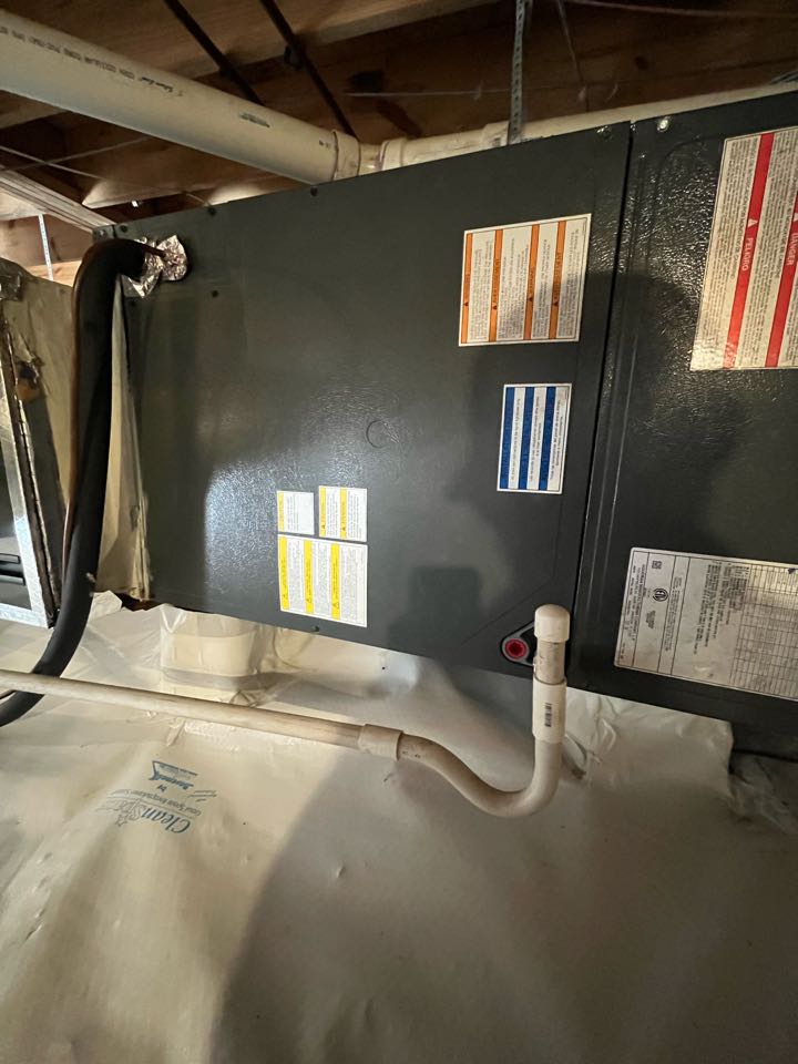 Goodman heat pump heating maintenance and condensate overflow installation. 