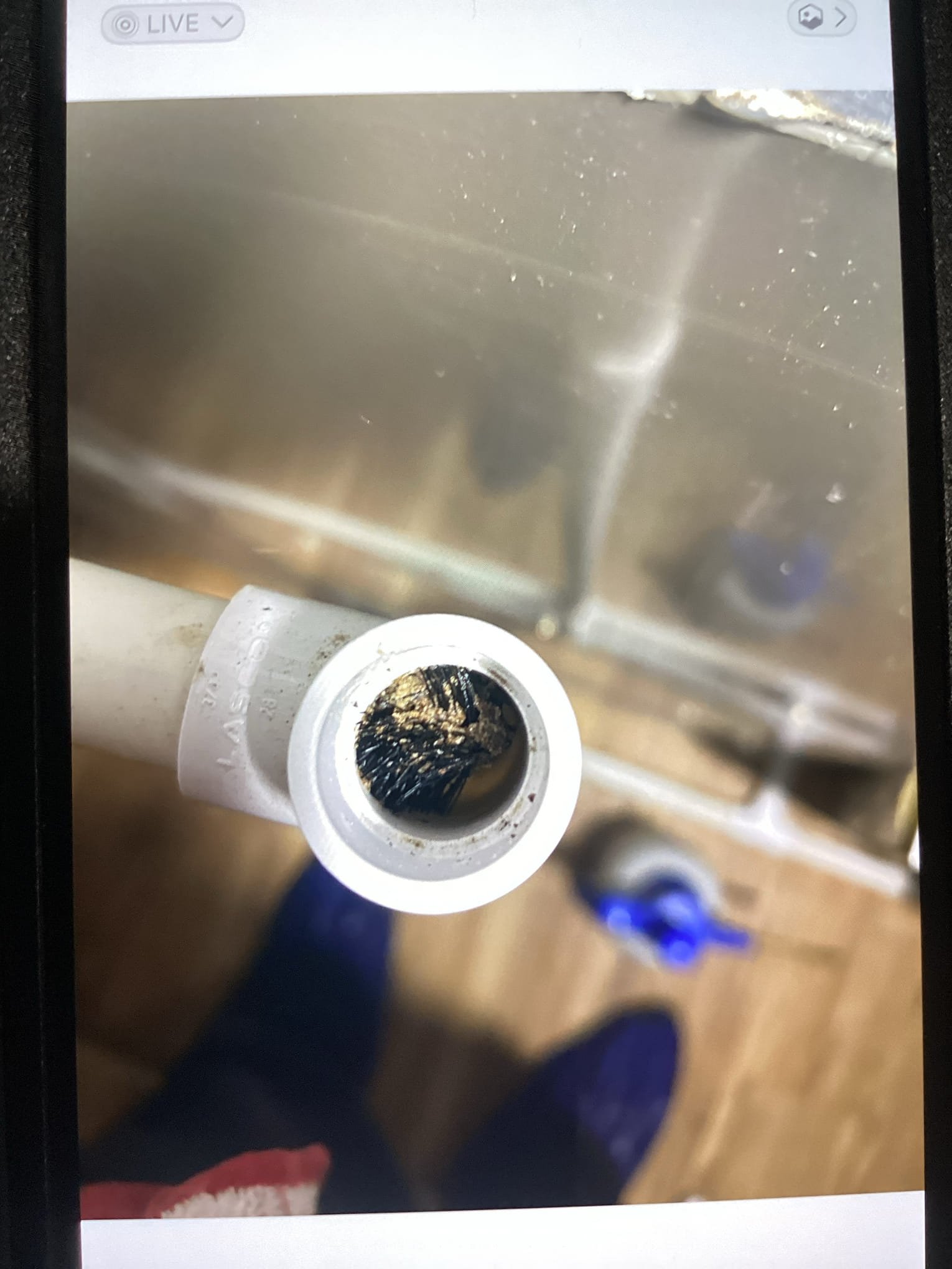 
Upon arrival customer stated the water flows above the furnace and onto the floor.
When checking on the unit found no water currently leaking but also unit is not running.
Customer stated it only happens when he dials the temp below 73/72

When checking the condensate drain line found it almost plugged up.
See picture 
Informed customer.
Per customer ok to clean piping 

Cleaned condensate drain piping, all flowing properly now.

