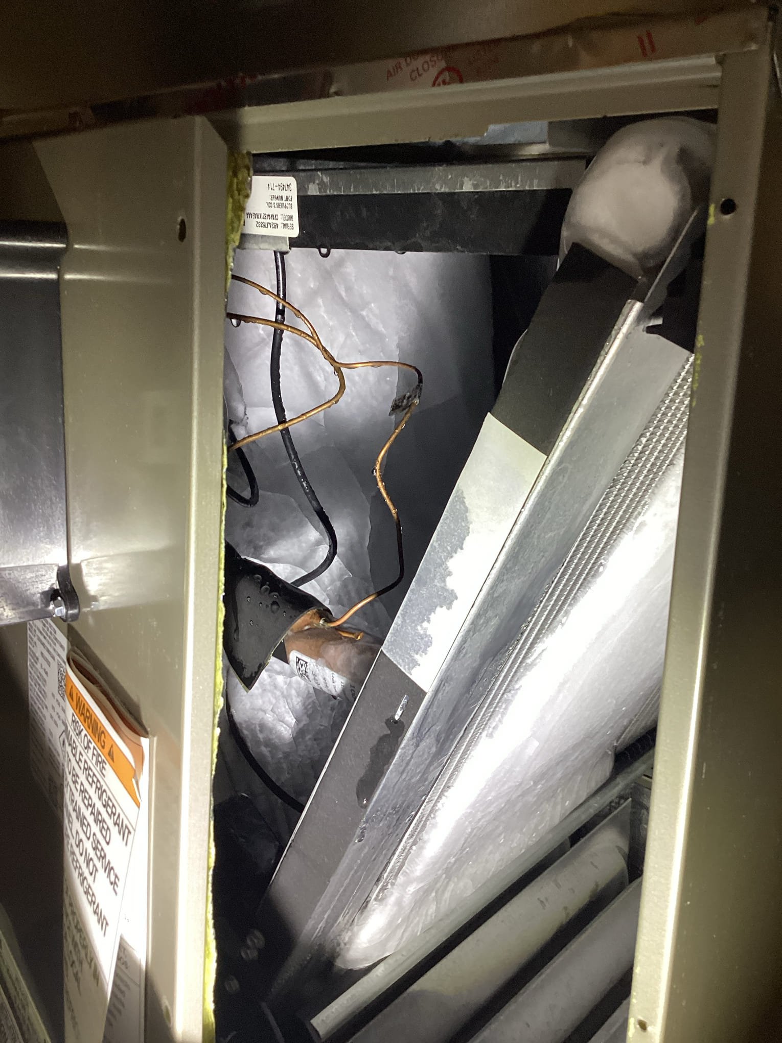 
Upon arrival furnace blower unit is operating but no old air blowing

Upon investigation of furnace unit found water all over the floor, 
Removed evaporator cover and it was all frozen inside - see picture.

Unable to troubleshoot at this time. Coil must defrost about 24 hrs

Unit with an water problem:
Evaporator Coil - CVAVA4821XMAEAAA
Furnace - 59TP6B100V211120
AC Condenser - 26SPA648W0030001

 Will need to reschedule visit

2 zoned system freezing up->
Verified zone system functionality, system has two thermostats and 4 4 valves.
2of which I didn’t record moving when I’ve activated their thermostats, upon further inspection I’ve found one with wiring that doesn’t match the others, fixed this and 2 more valves sprung to life.
-filter is not very old, but is fairly plugged.
-set blower speed it would appear that the furnace thought that the AC was two stage, it is not, set both speeds at the same speed for staging so it is irrelevant.
-in summary, there was a restriction in air deli