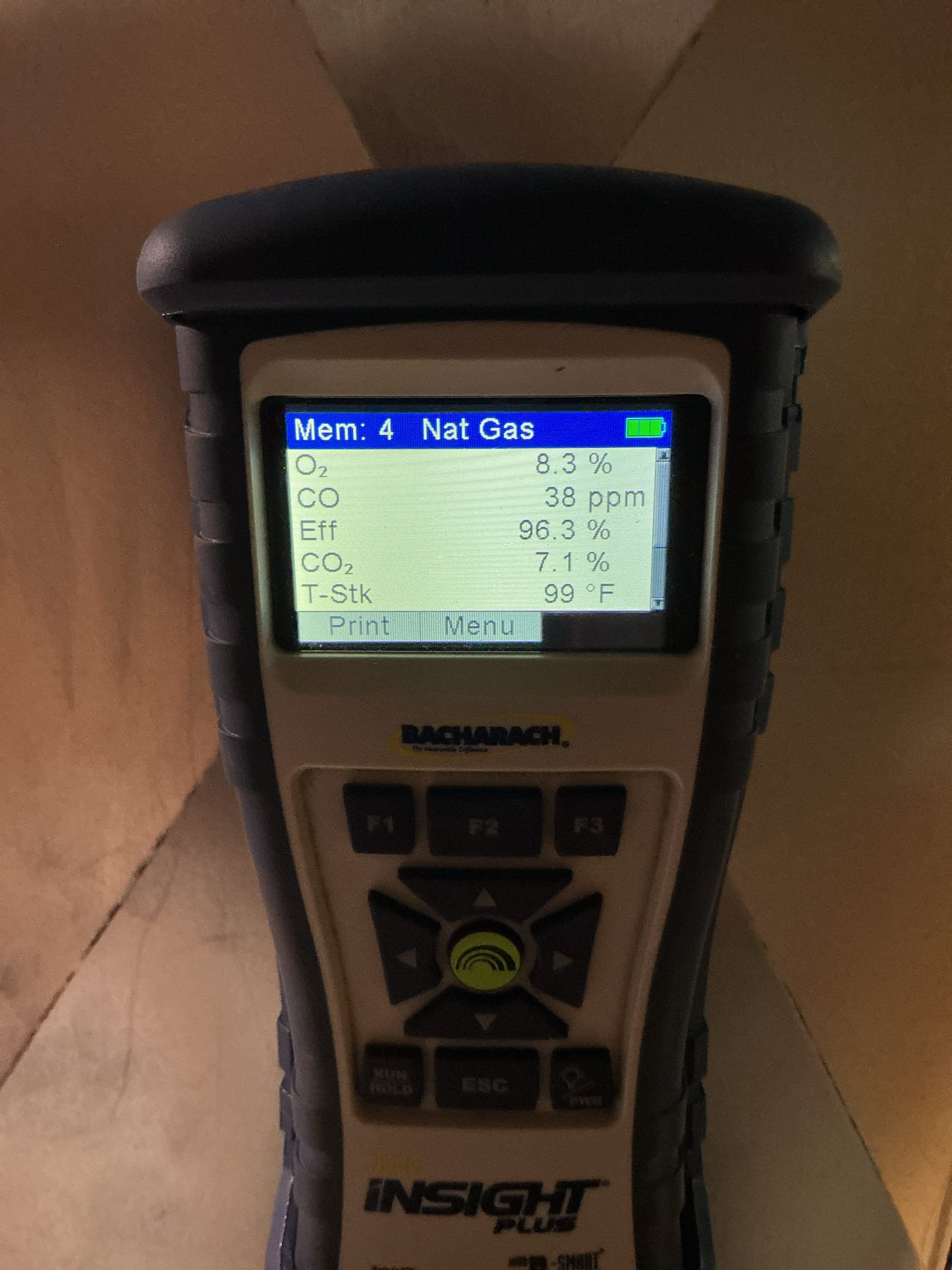 Top Rank furnace maintenance performed on an approximately two-year-old furnace, including air filter and humidifier pad replacement, flame sensor and condensate P-trap cleaning, electrical connection tightening, blower wheel inspection, and condensate drain pump testing. Combustion analysis was completed with all results testing great, and the results will be attached to the invoice. No further work is needed at this time.