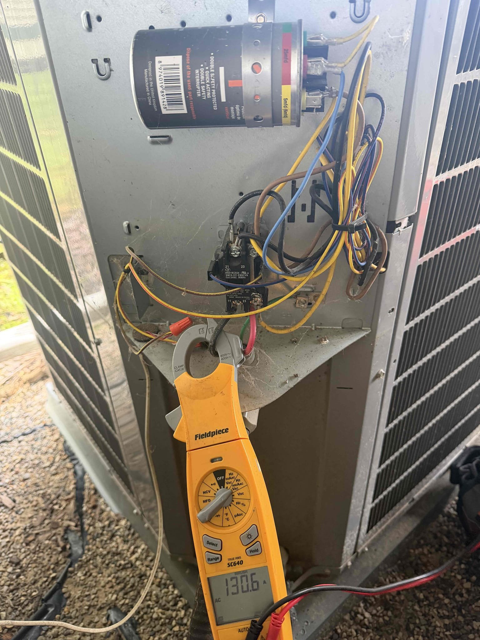 Performed Top Rank air conditioning and furnace maintenance in Wixom, Michigan, on a system approximately nine years old. Completed full furnace maintenance, including cleaning the flame sensor, blower wheel, condensate P-trap, and between the burner ports; combustion analysis was good, with readings attached to the invoice. Air conditioning maintenance was completed with good refrigerant readings and overall operation; a high inrush amp draw was noted, so a quote for a soft-start kit will be provided, with no further work needed at this time.