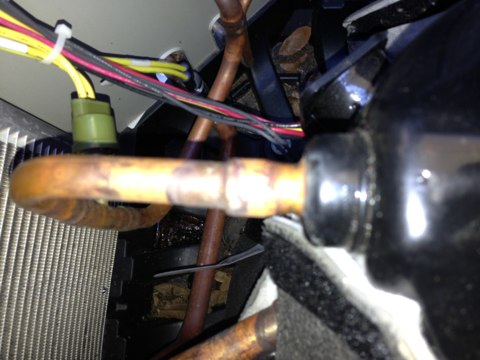 A/C service on a 5 year old system, freon low. Performed Electronic leak search. Leak at condenser 