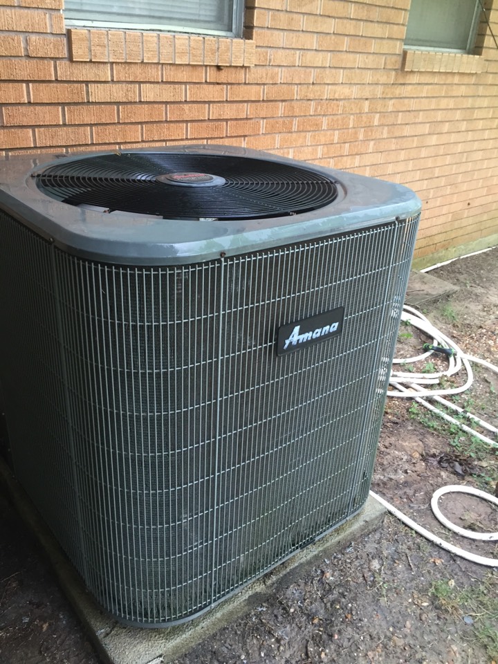 A/C service on a 8 year old Amana system. Freon good. Algae tablets in drain pan prevent overflow. Unit cooling good.