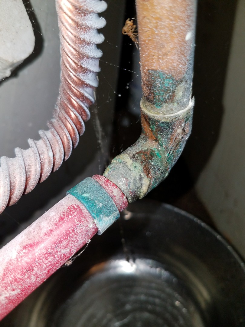 Repair hot water leak in pipe