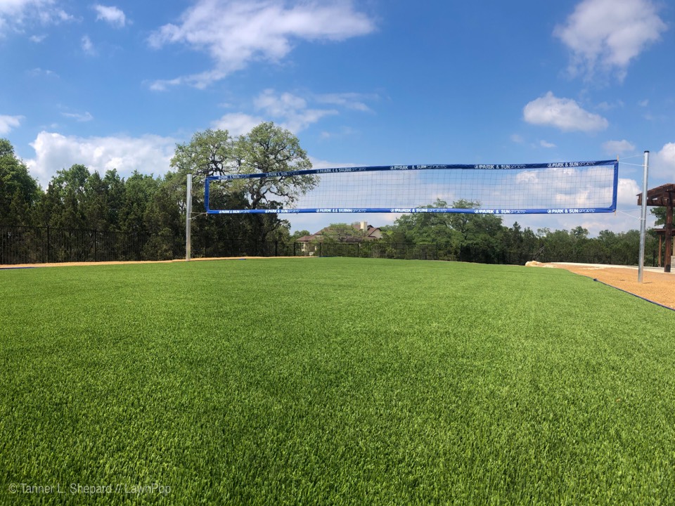 We installed this LawnPop Artificial Turf volleyball court in the vintage Oaks New Braunfels  and San Antonio subdivision. This master-planned community will utilize a LawnPop synthetic synthetic grass sport court for all of their projects. This housing development will start saving money and water to help with eco-conservation and water saving methods.