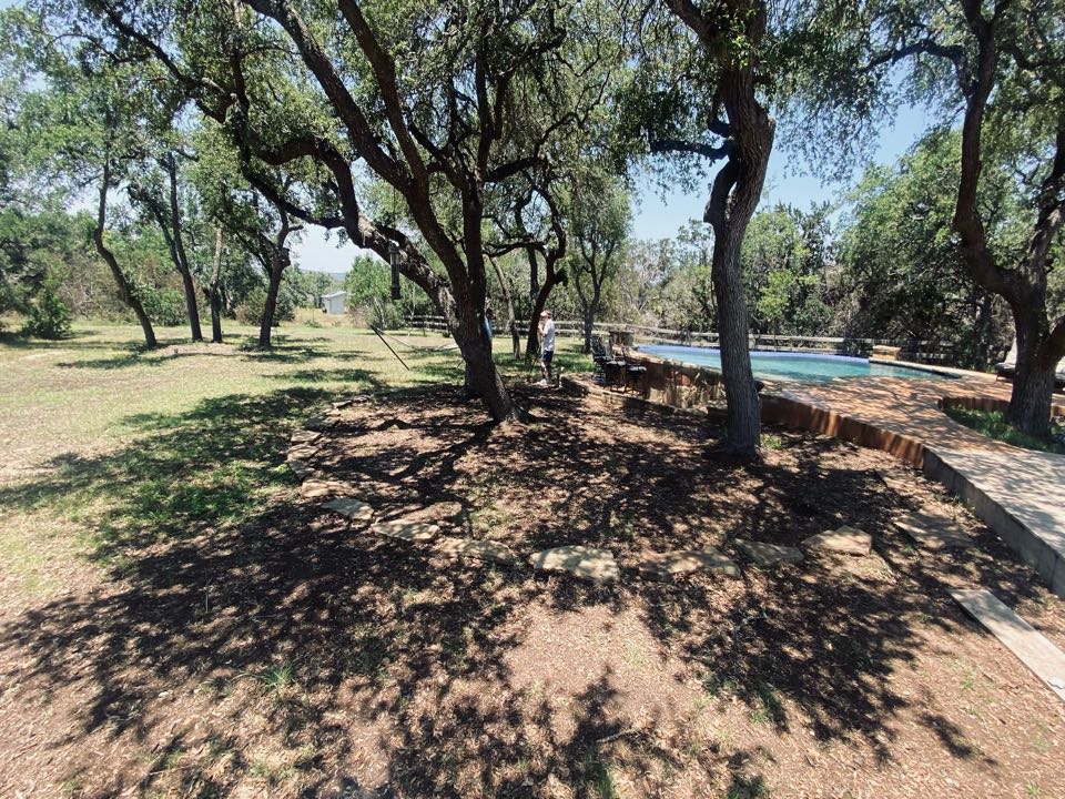 We are excited to install LawnPop artificial grass in this dripping springs Ranch Homestead. This is the perfect place for LawnPop synthetic turf underneath the live oaks around the swimming pool. No more muddy paws and feet tracking in dirt into the house. This eco-friendly design solution by LawnPop, artificial turf will start saving the homeowner money, water, and precious resources.  