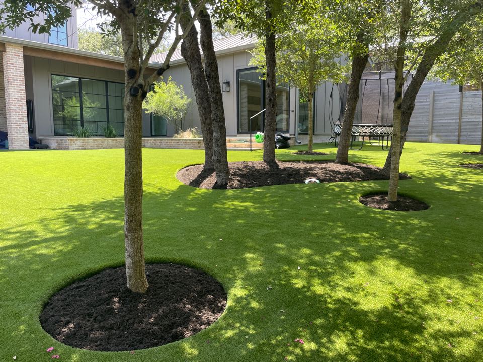 Beautiful LawnPop, synthetic turf playground amongst the live of trees.  This Westlake Austin home in lost Creek neighborhood is going to save water and money on utility bills.  No more muddy feet, maintenance and tracking dirt into the house.  