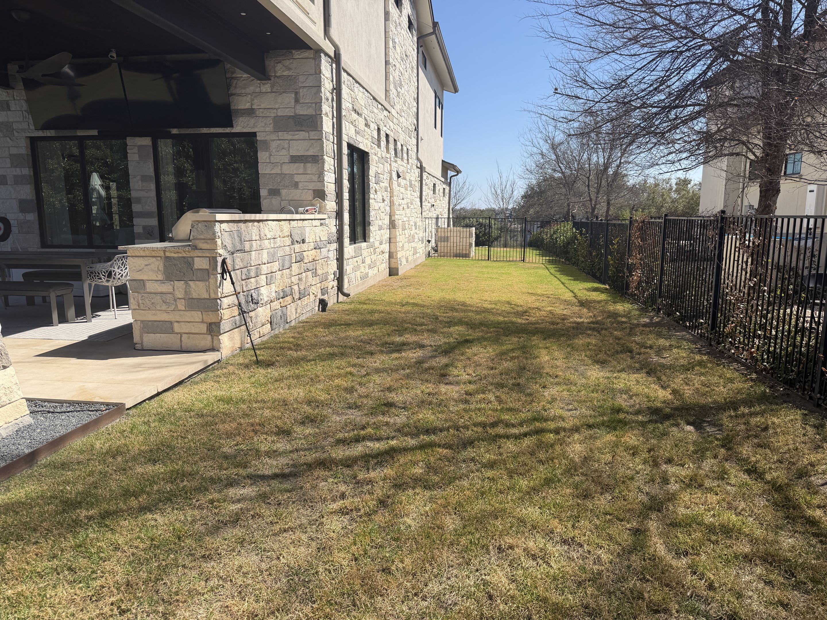 Austin, TX - We are installing a LawnPop synthetic turf, luxury golf green in this backyard. 