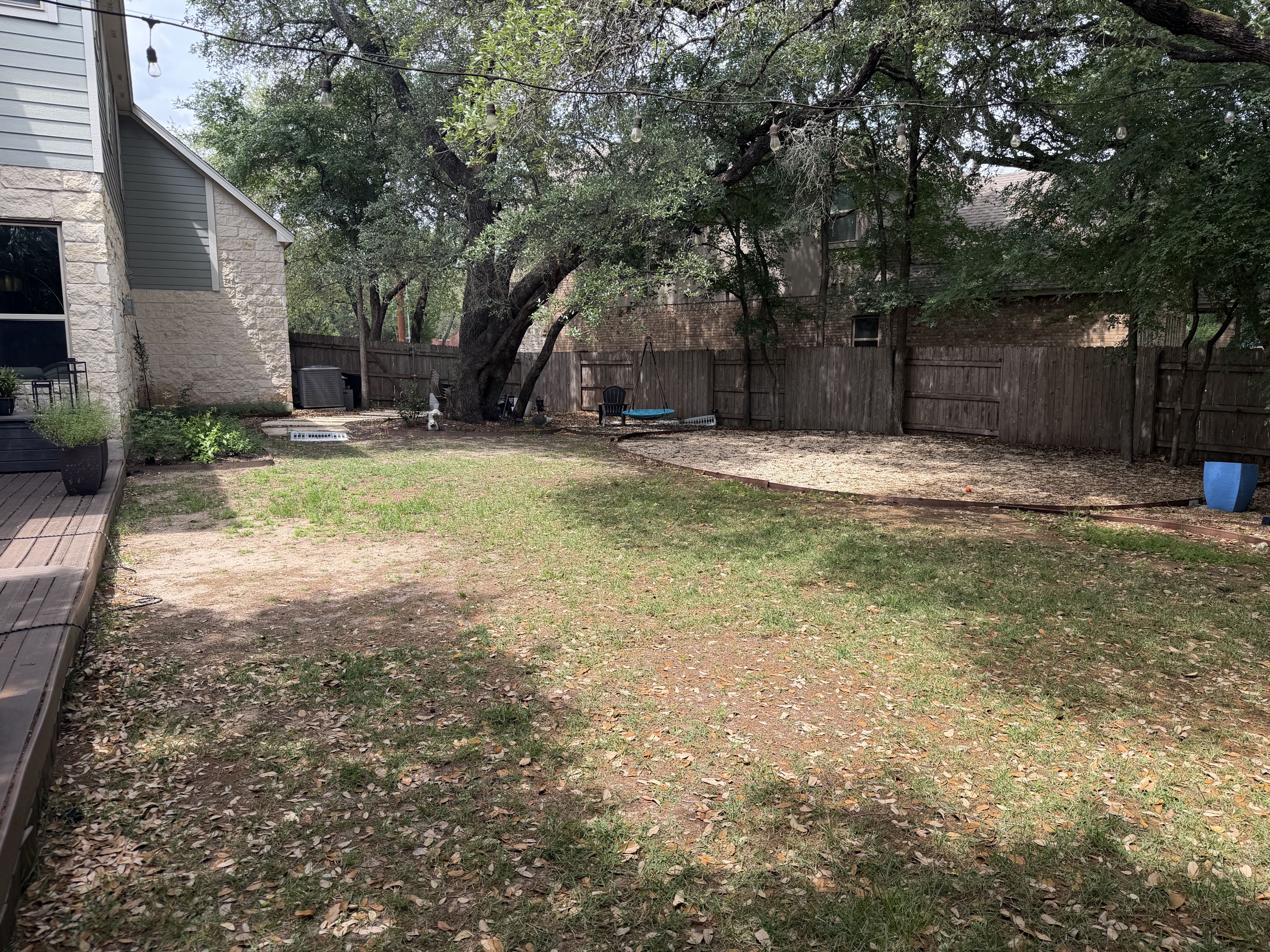 Austin, TX - Too much shade and real grass will not grow. This homeowner will start saving water and freeing up their lawn maintenance time.  LawnPop synthetic turf is a great solution for this backyard.  