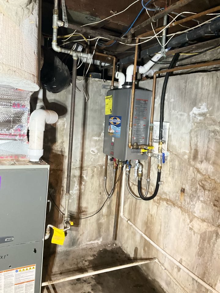 Repaired sump pump drain and serviced tankless water heater