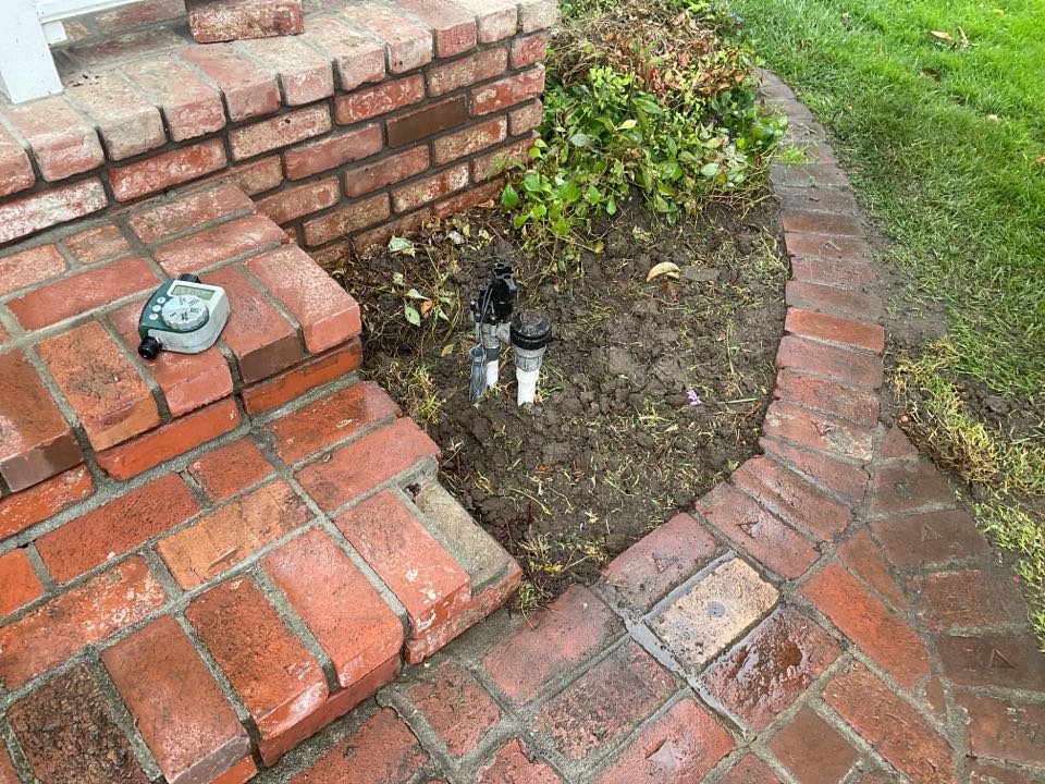 Repaired broken sprinkler line