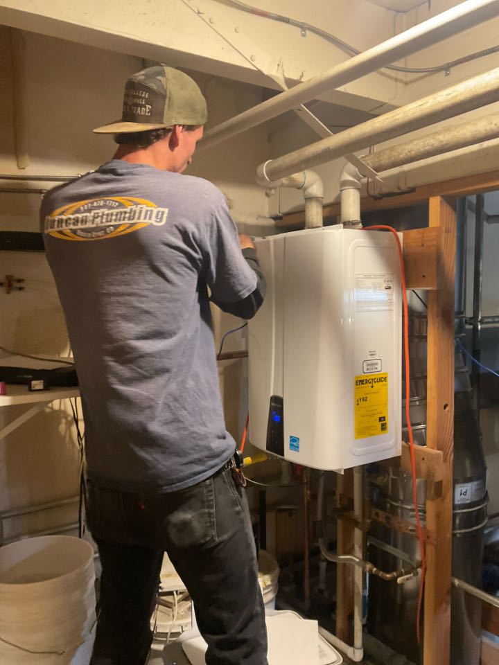 Zach repaired a tankless water heater.