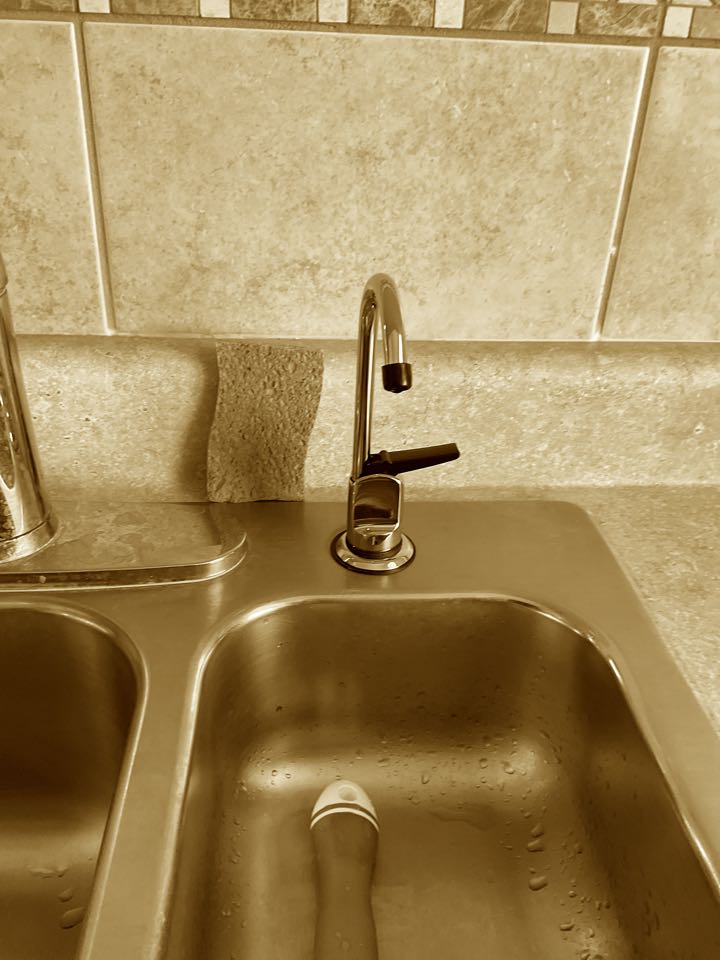 Replaced water filter dispenser