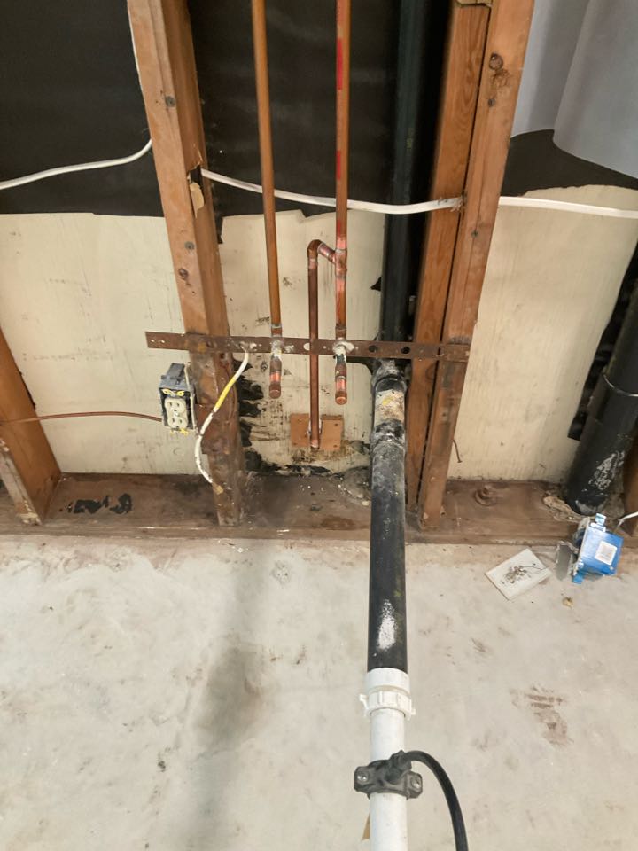 Repaired broken water lines in wall