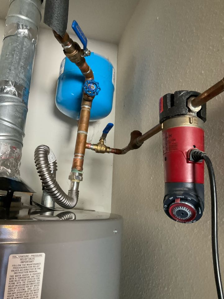 Repaired faulty return line for a water heater.