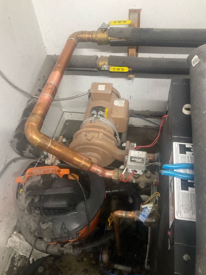 Repaired leaking piping for dual boiler hot water system.