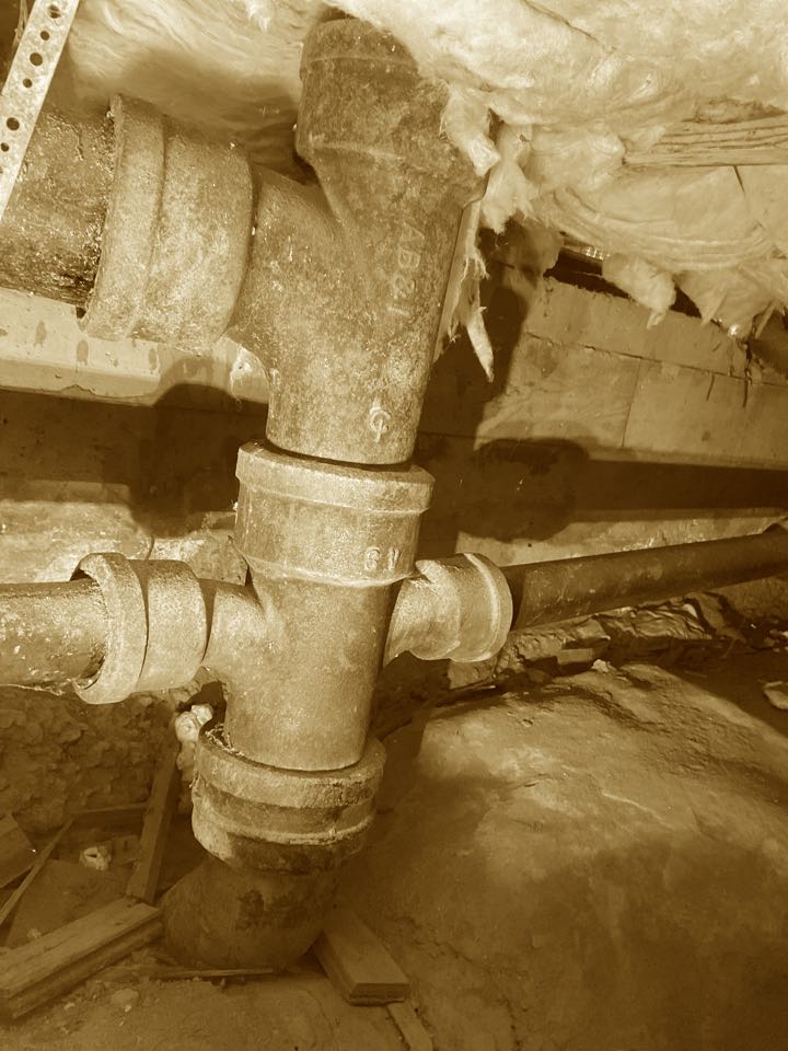   Inspected piping in a crawl space.