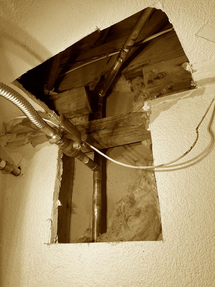 Repaired leak in a ceiling