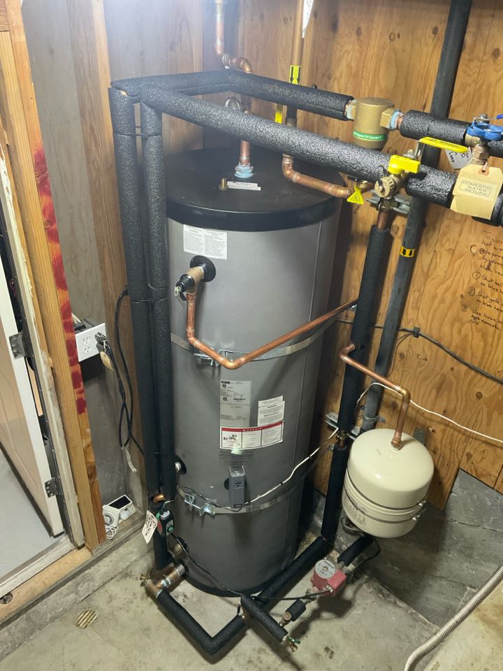 Replaced indirect hot water storage tank.