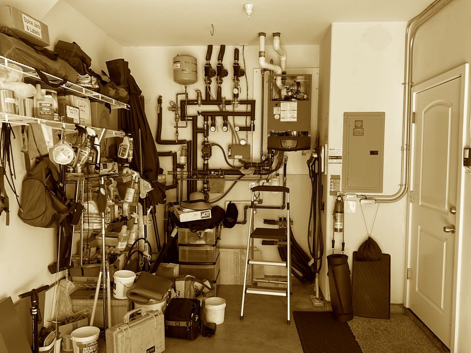 Serviced condensing boiler for a hydronic heating system