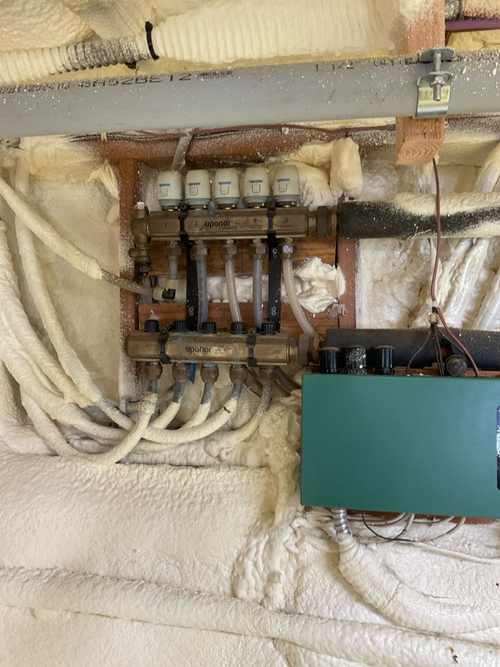 Repaired hydronic heating system manifold.