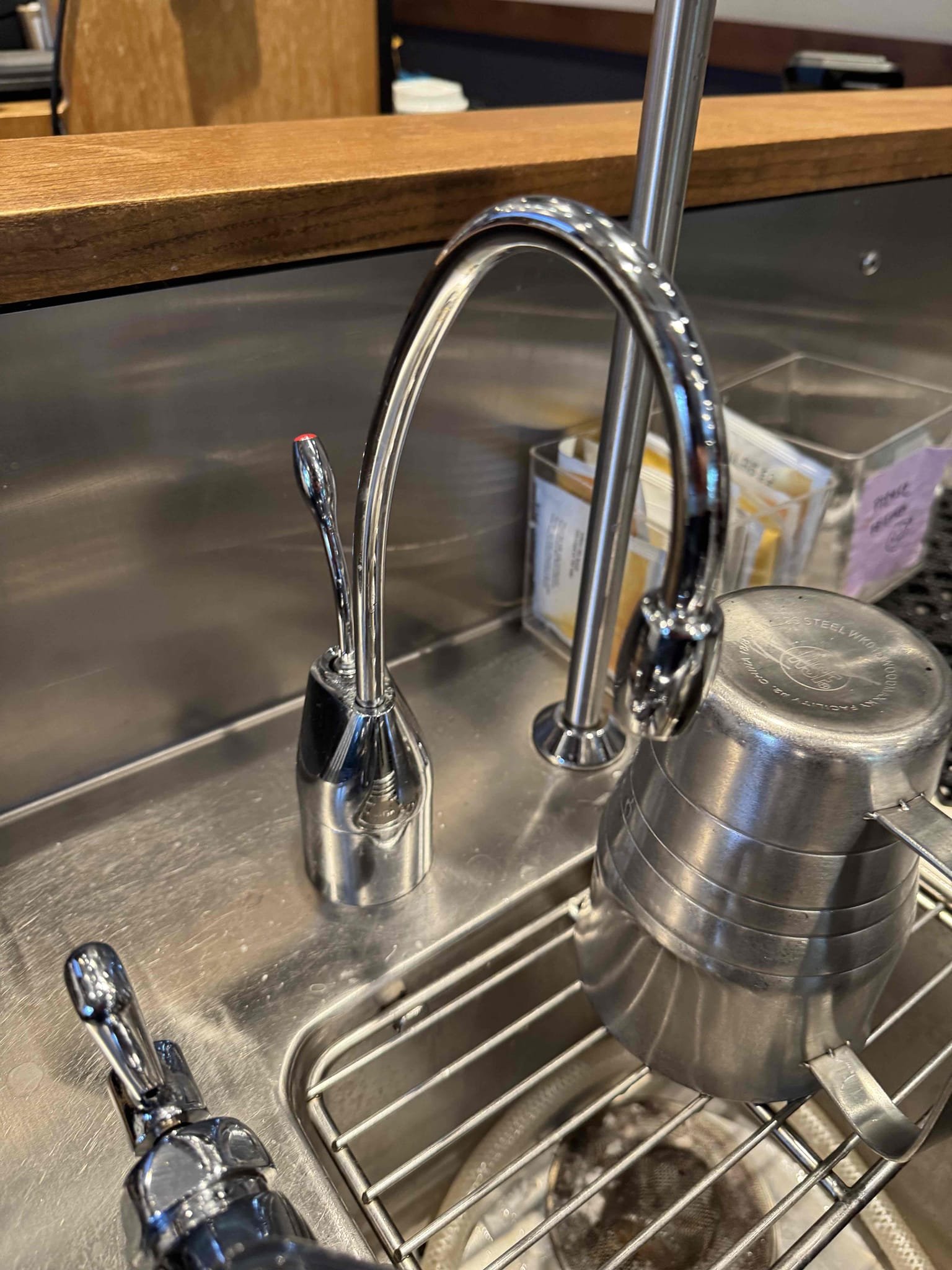 Upon arrival, I began by examining the faucets, which were equipped with aerators. I inspected the left instant hot faucet, which had been recently installed. I carefully checked the aerator and ensured it was functioning properly. Next, I moved on to inspect the water heater and its associated filters. I found everything to be in good working condition, with no signs of wear or damage. The water heater was operating efficiently, and the filters were clean and free from debris. Overall, the inspection confirmed that the system was in excellent condition.