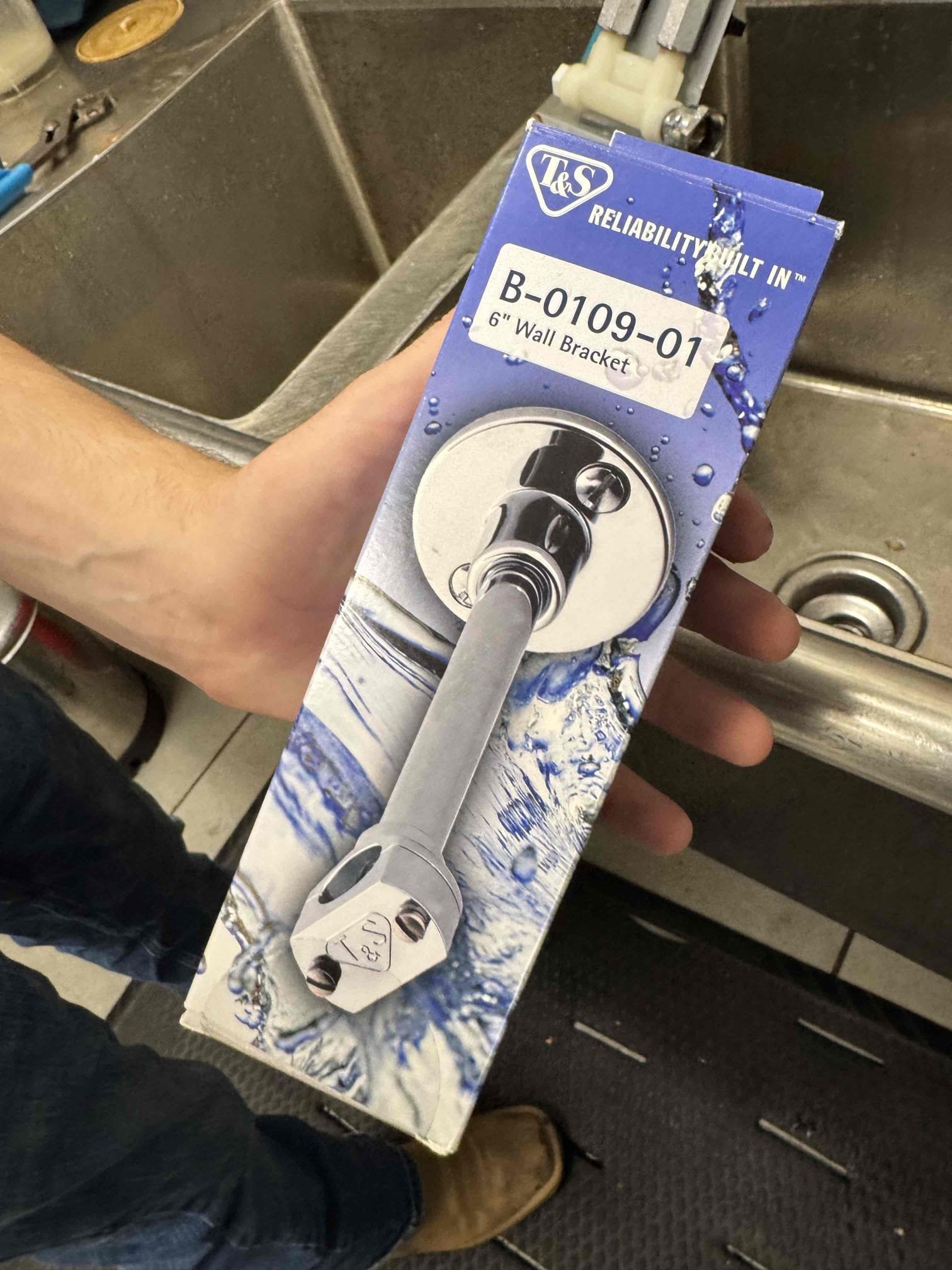 Upon inspection, the soap dispenser on the faucet at the comp sink was leaking due to a faulty washer. I replaced the washer, resolving the leak. The pre-rinse faucet's support bar was broken, causing the riser tube to be insecure. I installed a new support bar, ensuring the riser tube is now secure. Additionally, the handle on the add-on faucet was broken, preventing it from turning off properly. I replaced the handle, restoring full functionality. All repairs were completed using a TNS handicap handle, a TNS faucet support bar, and a hose washer.