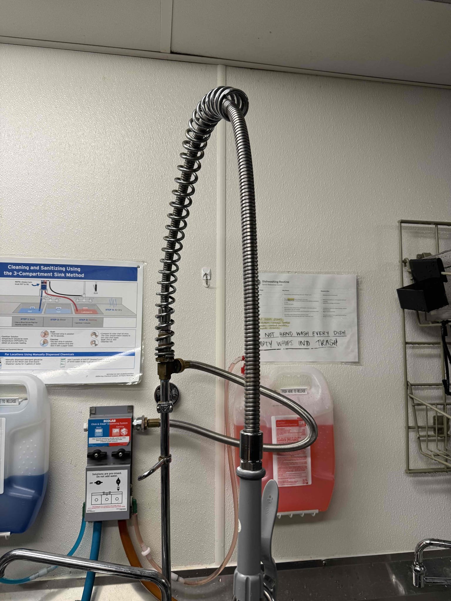 Upon identifying a break in the metal casing of the SS flex hose, I promptly sourced a replacement. I removed the old sprayer and hose, then extracted the spring. A new T&S SS flex hose was installed into the existing spring. After resetting the sprayer, I conducted thorough testing to ensure functionality. Throughout the process, I was supervised by Manager Judith. The replacement parts used included a T&S SS flex hose measuring 44 inches.