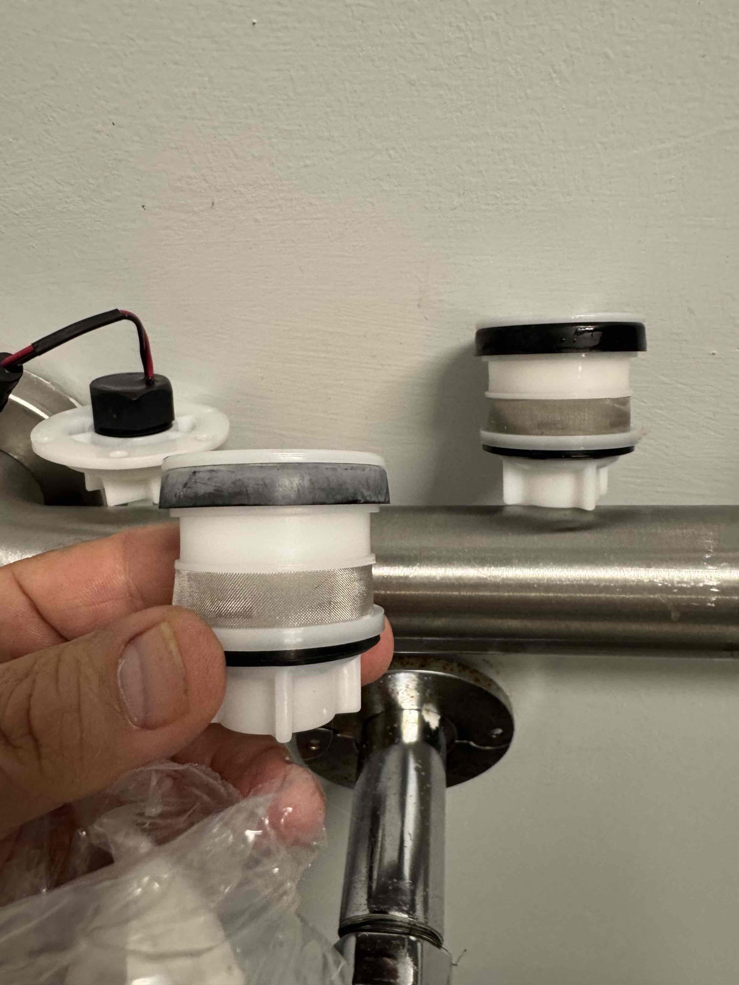 I replaced the faulty piston and solenoid in the Zurn ZTR flush valve located in the men’s bathroom. After installing the new Zurn solenoid and piston, sourced from MSC, the toilet resumed its proper flushing function. The job was completed efficiently, ensuring the bathroom fixture operates smoothly. The customer, Tim, signed off on the work, confirming satisfaction with the repair.