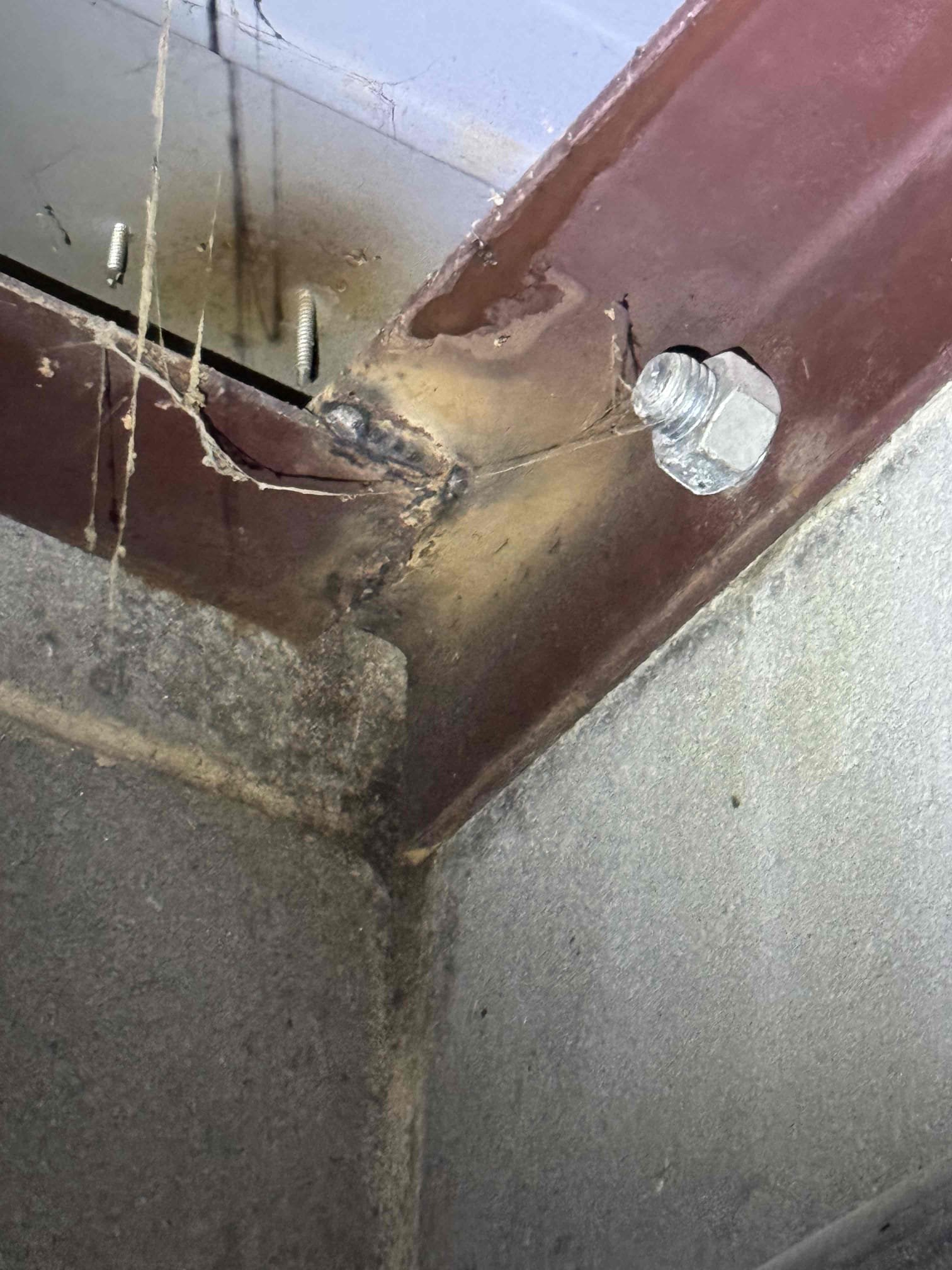 Upon inspection, I discovered a minor leak originating from the corner of the rooftop, which was seeping into the store. To address this, I accessed the ceiling and identified the precise location of the issue. I then climbed onto the rooftop, ensuring the area was clear to facilitate the roofer's work. Additionally, I took the opportunity to clean the roof drain grates while I was up there. This issue was located in the back right corner, to the right of the ladder when ascending. I signed for Tritton upon completion of these tasks.