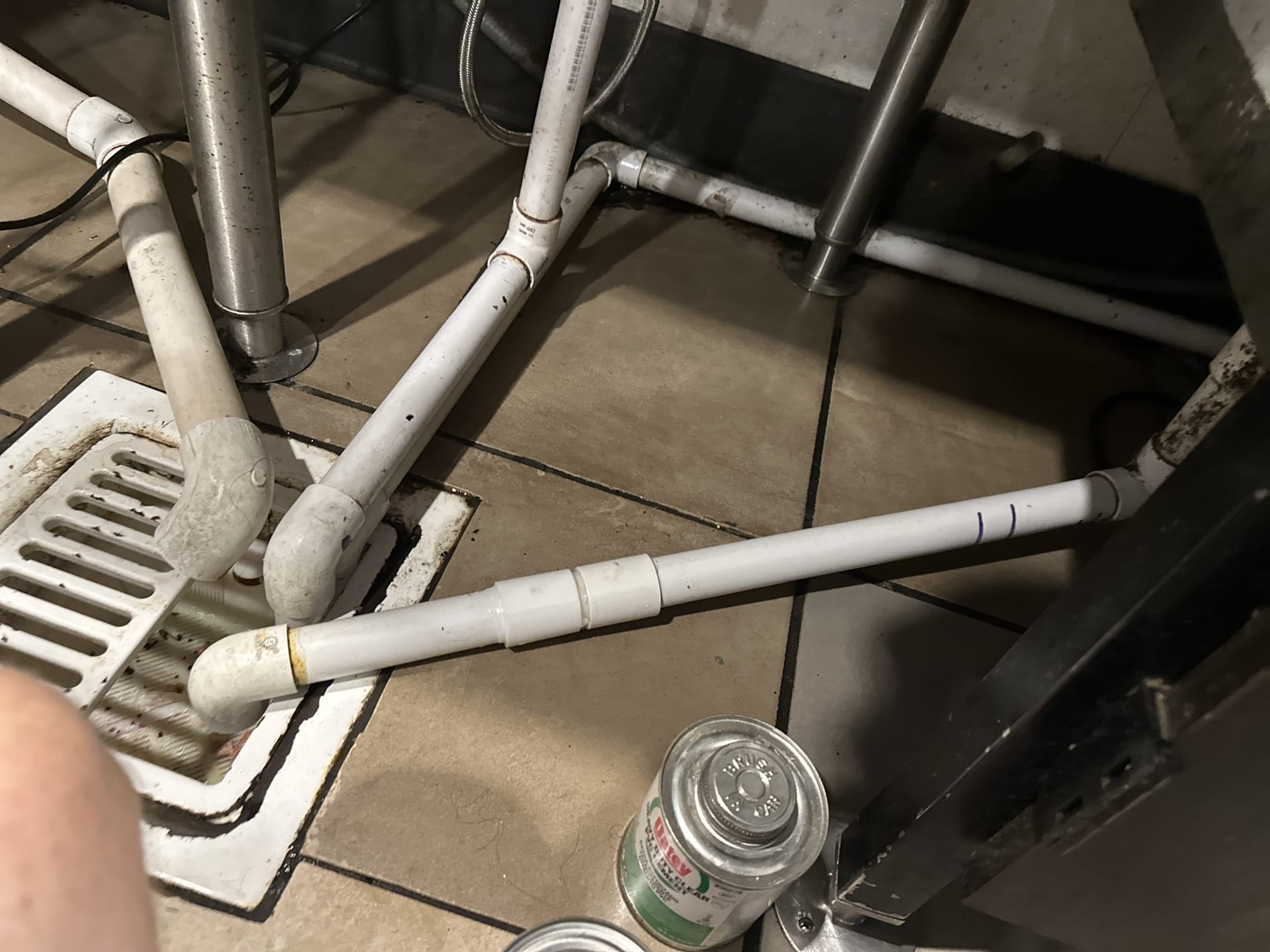 Upon arrival, I first consulted with the manager to understand the issue. The 1-inch PVC ice bin drain had a 1-inch 1/4 fern coupler that had failed, causing a leak. I carefully removed the faulty fern coupler and assessed the situation. To resolve the issue, I installed a new fitting and connected it with a hard pipe to the floor sink. This ensured a secure and leak-free connection. The drain is now functioning properly. I used 4 inches of 1-inch PVC and two 1-inch PVC couplers to complete the repair. The job was completed efficiently, and the leak has been successfully resolved.
