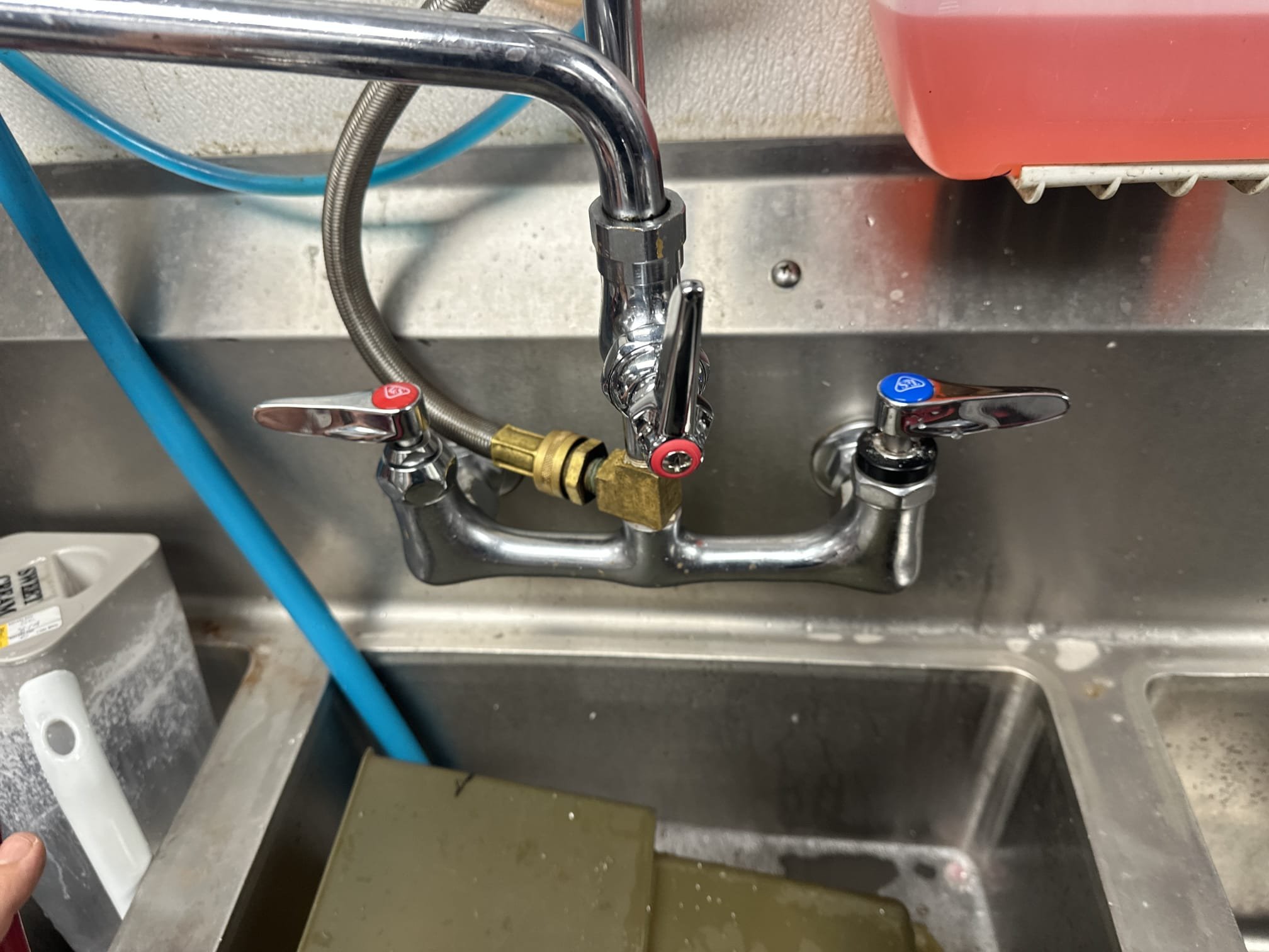 Upon arrival, I inspected the faucet on the three-compartment sink. The diverter handle was stripped, and the screw had broken off in the stem. I removed the old cartridge and installed a new one with the handle. After turning the water back on, I checked for leaks, which were non-existent. The faucet was then operating correctly. Additionally, the handles for the hot and cold faucets did not match. I removed the cold handle and installed a matching handle to ensure uniformity. The parts used were a T&S cold side eterna cartridge with handle and a T&S eterna handle. The job was completed efficiently, ensuring the sink's functionality and aesthetic appeal.