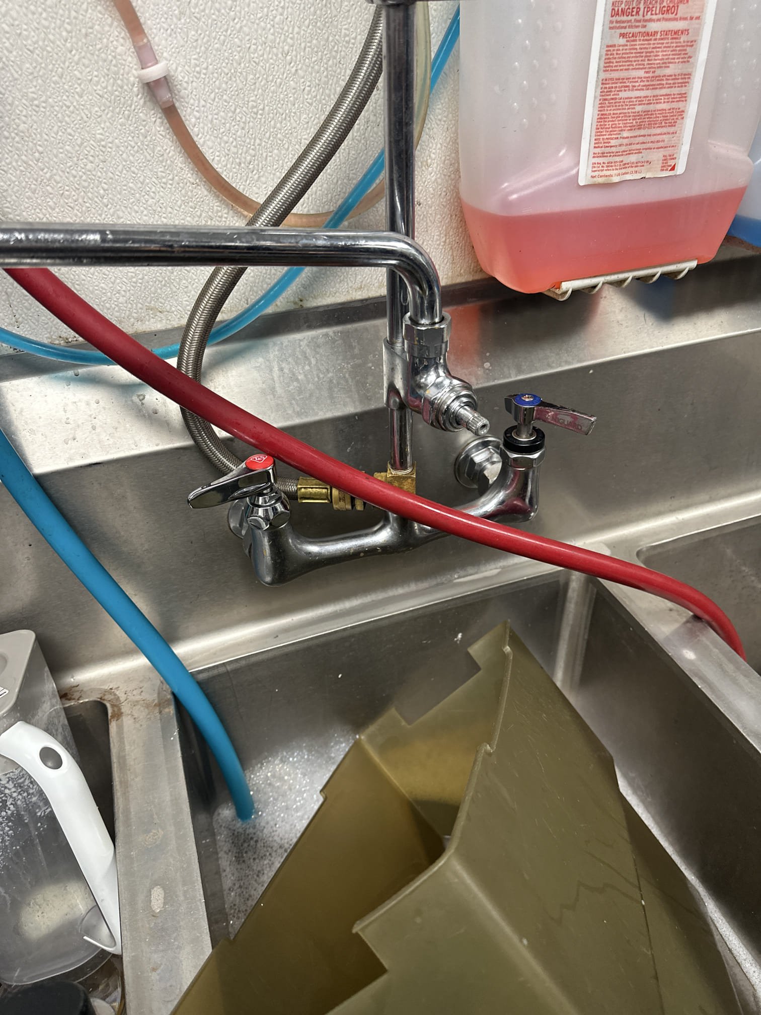 Upon arrival, I inspected the faucet on the three-compartment sink. The diverter handle was stripped, and the screw had broken off in the stem. I removed the old cartridge and installed a new one with the handle. After turning the water back on, I checked for leaks, which were non-existent. The faucet was then operating correctly. Additionally, the handles for the hot and cold faucets did not match. I removed the cold handle and installed a matching handle to ensure uniformity. The parts used were a T&S cold side eterna cartridge with handle and a T&S eterna handle. The job was completed efficiently, ensuring the sink's functionality and aesthetic appeal.