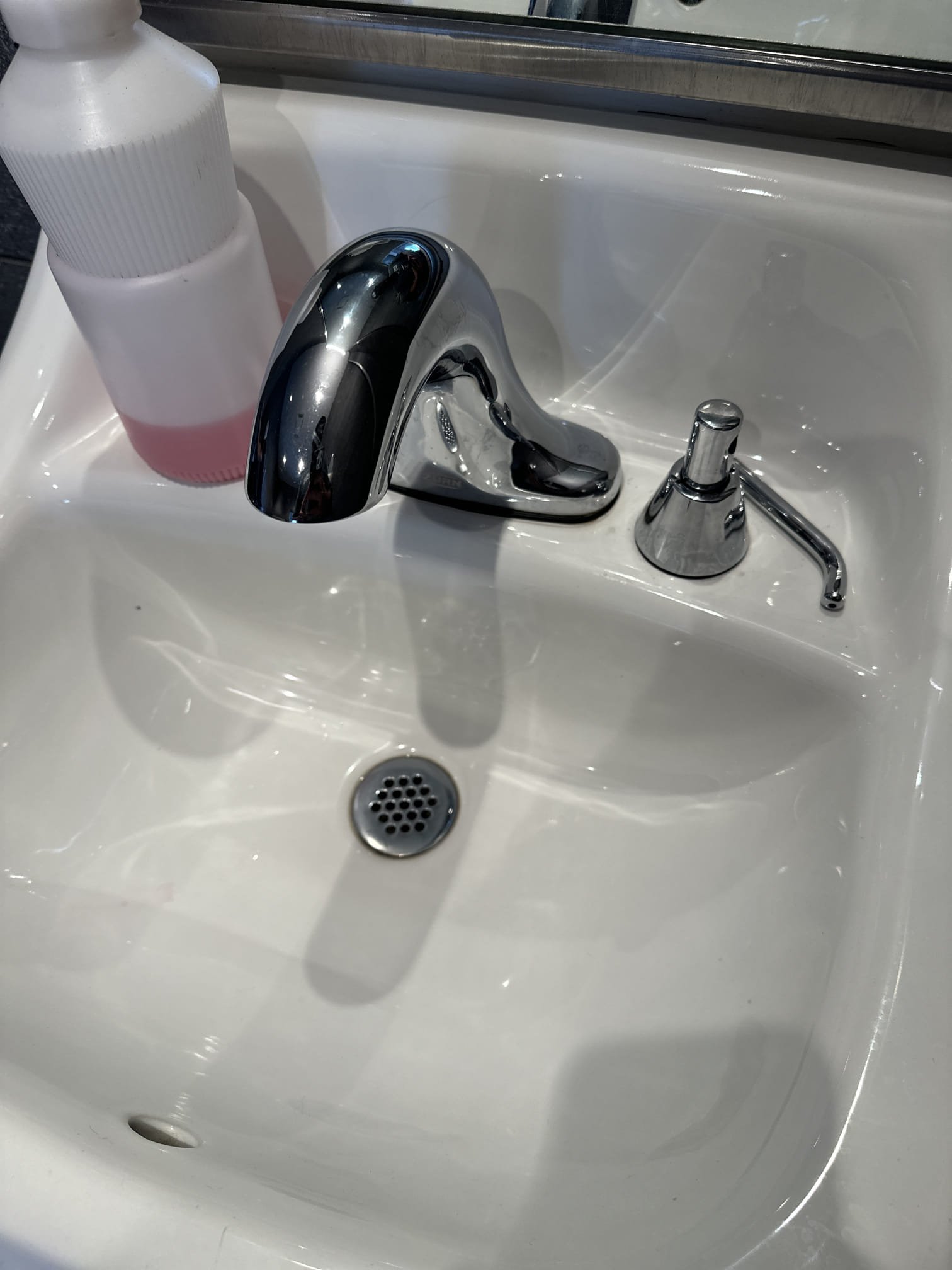Upon inspection, the soap dispenser in the bathroom was found to have a broken spout. This in-sink dispenser required immediate attention. To ensure the store had a functional bathroom, I relocated the working soap dispenser from the left bathroom to the right bathroom. Consequently, the left bathroom is currently out of order. I confirmed that a work order for new soap dispensers has been placed, and I provided a small bottle of Method soap for immediate use. The store is awaiting the new dispensers from their order catalog. I signed off for Autumn, ensuring the right bathroom remains operational while the left is temporarily unavailable.