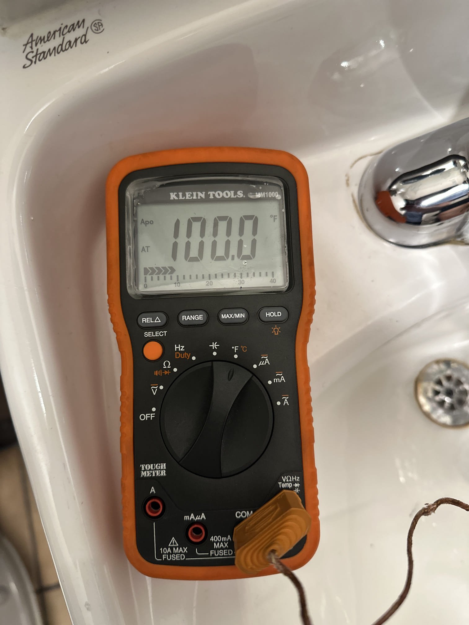 Upon inspection, both bathroom lavatory sinks showed high temperatures, exceeding 100 degrees. The left bathroom had a reversed hot and cold supply line issue. After swapping the lines, neither supply stop functioned. We scheduled a visit after hours to replace the faulty hot and cold supply stops. Upon arrival, we confirmed the need for an after-hours visit. After turning off the water heater and replacing the hot side stop, we switched the supply lines on the faucet. The job was completed in about an hour.