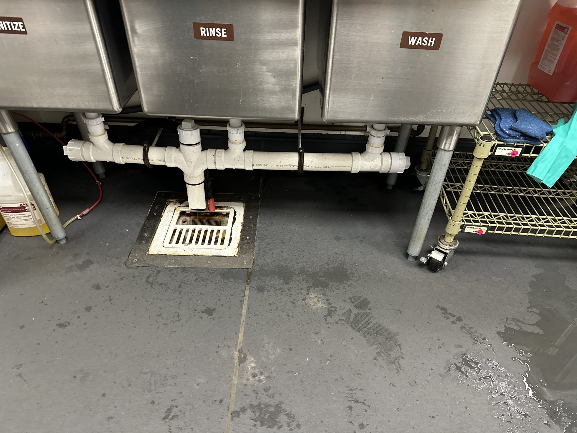 I conducted a thorough inspection of the drainage system and its surrounding area. Upon examination, I identified an extremely loose slip nut on the wash bay of the three-component unit. This loose connection was causing water to drip. I carefully secured the slip nut, ensuring a tight and secure fit. As a result, the dripping water issue has been resolved, and the system is now functioning properly.