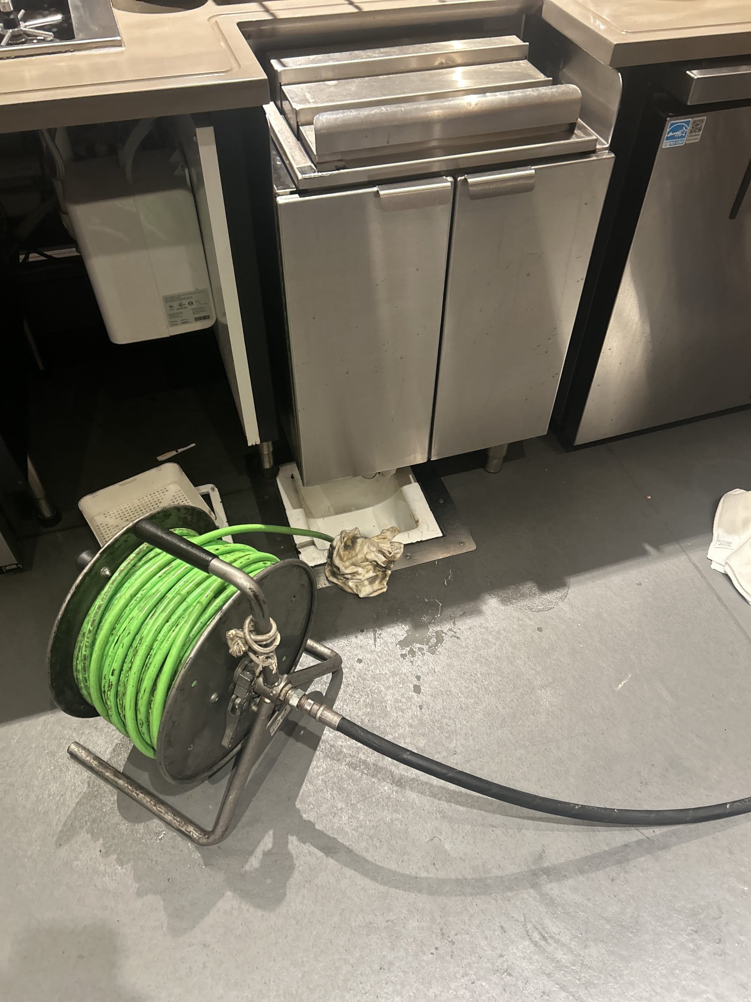 We addressed a recurring issue with slow-draining FOH drains, likely due to coffee and cream residue buildup. After consulting with the manager, we scheduled a service after hours to avoid strong odors. Upon arrival, we jetted the incoming side of the drain line and cleared the buildup from the clean out to the grease trap. Using a small jetter hose, we also cleared floor sinks. Finally, we flushed the system with hot water to ensure all residues were removed, resulting in clear drains.