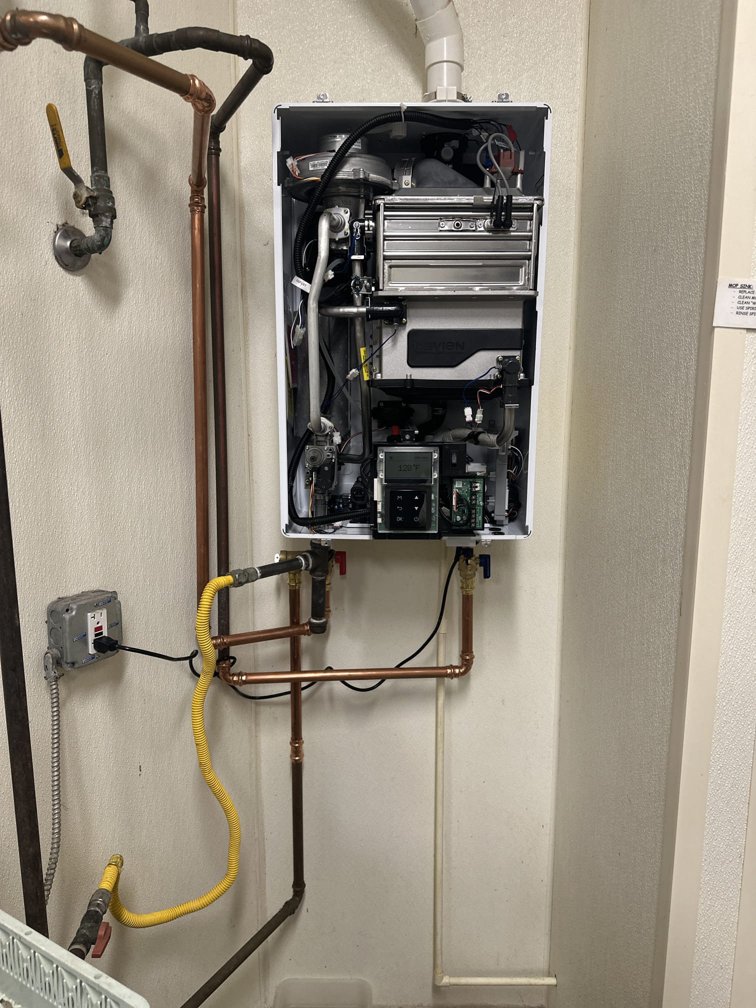 On September 11, I returned with a new Navien 240 A2 NG tankless water heater. I removed the old water heater and installed the new one, ensuring all fittings were securely connected. I turned on the water supply to check for leaks, finding none. After turning on the gas, I fired up the heater and set the temperature to 140 degrees. The heater is now operating correctly without any issues.