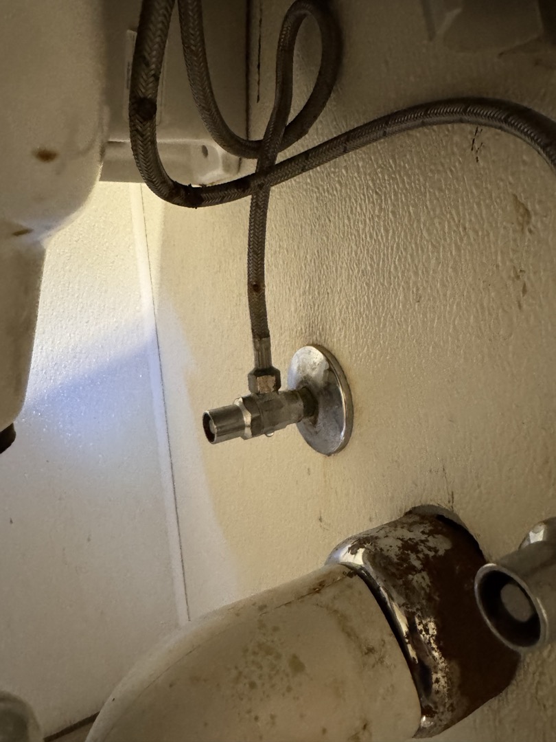 Upon arrival, I identified a significant leak originating from the inside of the employee bathroom faucet, compounded by a cut in the hot supply line. The faucet required immediate replacement to prevent further damage. I communicated with the manager, Tiffany, to inform her of the situation and our plan to return with the necessary replacement parts. Upon returning with the new TNS single hole single handle faucet, I replaced the faulty unit. The new faucet is now functioning correctly, with no signs of leakage. Additionally, I informed Tiffany that the floor needed mopping due to residual water from the leak. The job was completed to satisfaction, and I signed off with Tiffany for the replacement of the TNS faucet single hole single handle.