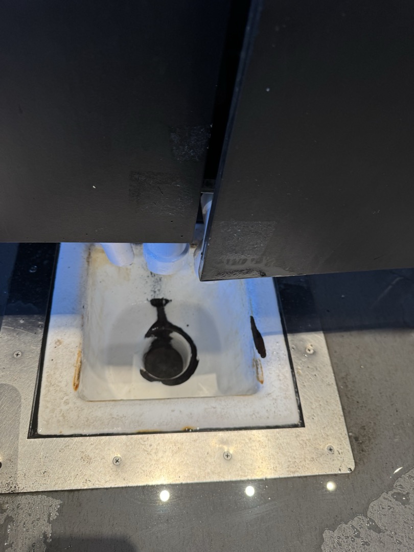 Upon inspection, the floor sink trap exhibited significant buildup, which was impeding proper drainage. I meticulously cleaned the trap, ensuring all debris was removed. Following this, I applied a specialized drain cleaner to dissolve any remaining residue. I then flushed the drain with hot water to ensure complete clearance. Throughout the process, I monitored the sink to confirm that the drain was functioning optimally. The job was completed to satisfaction, and I verified the effectiveness of the drain by observing proper water flow. I signed for Carolyn and used one bottle of Glug for the cleaning process.