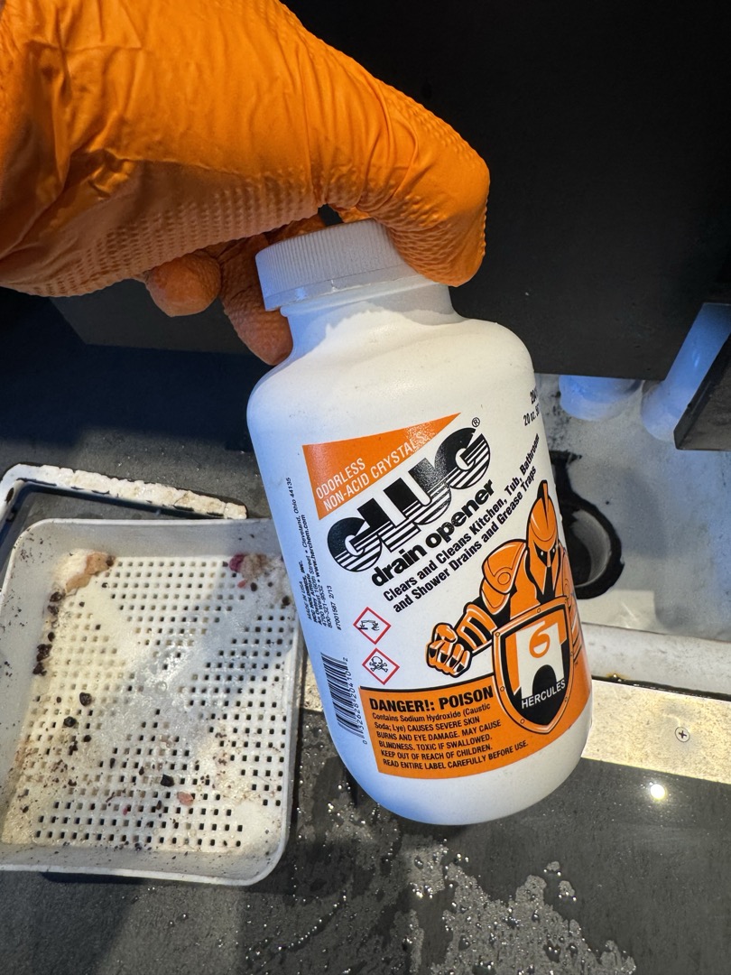 Upon inspection, the floor sink trap exhibited significant buildup, which was impeding proper drainage. I meticulously cleaned the trap, ensuring all debris was removed. Following this, I applied a specialized drain cleaner to dissolve any remaining residue. I then flushed the drain with hot water to ensure complete clearance. Throughout the process, I monitored the sink to confirm that the drain was functioning optimally. The job was completed to satisfaction, and I verified the effectiveness of the drain by observing proper water flow. I signed for Carolyn and used one bottle of Glug for the cleaning process.
