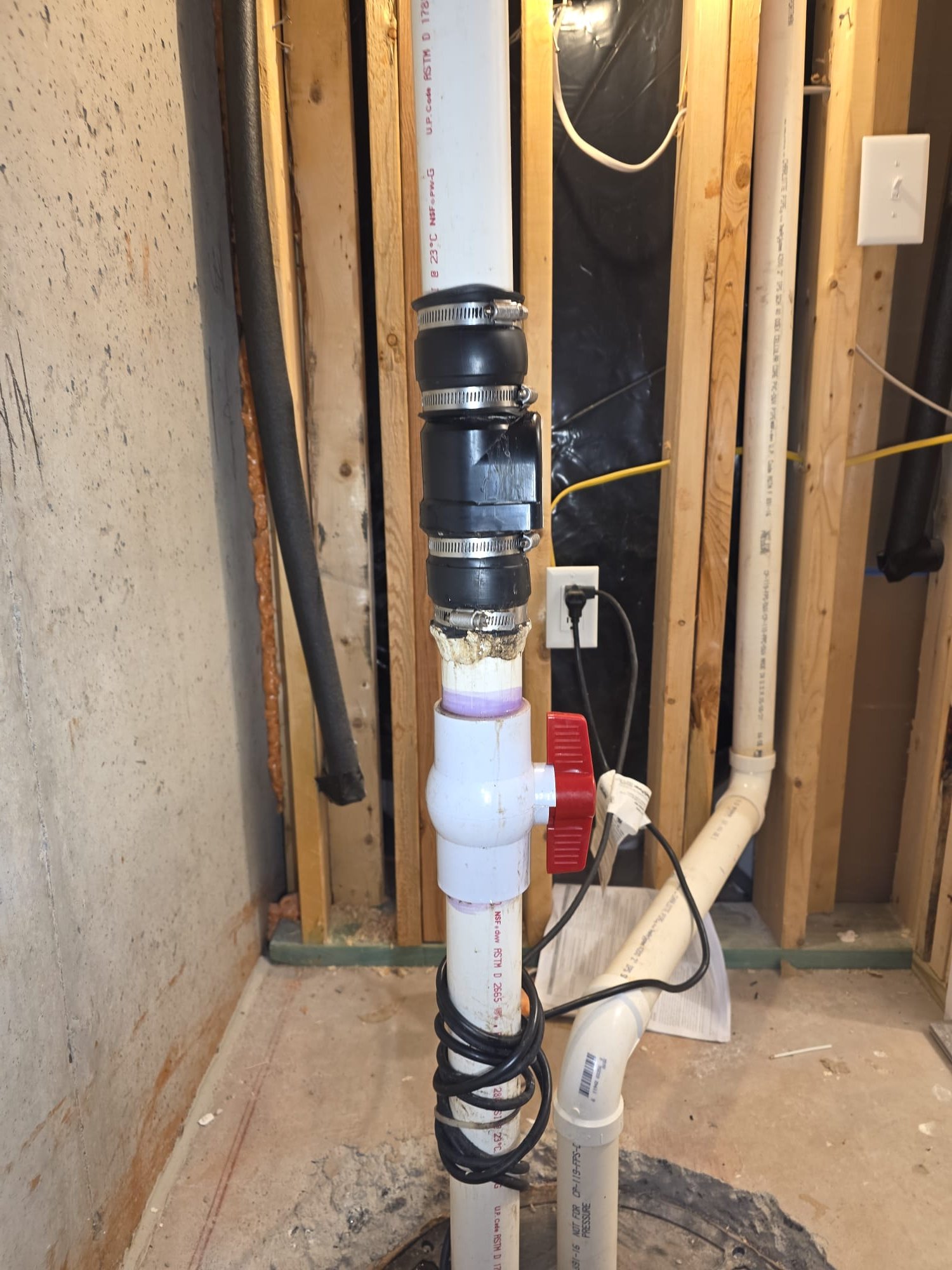 Upon inspection, the check valve was found to be malfunctioning, causing a leak in the sewer system. I replaced the faulty check valve to prevent further leakage. Additionally, the service valves were incorrectly positioned on the discharge pipe, which could lead to operational inefficiencies. I relocated the service valves to their proper positions, ensuring optimal performance of the ejector pump. These adjustments were made to maintain the system's integrity and efficiency.